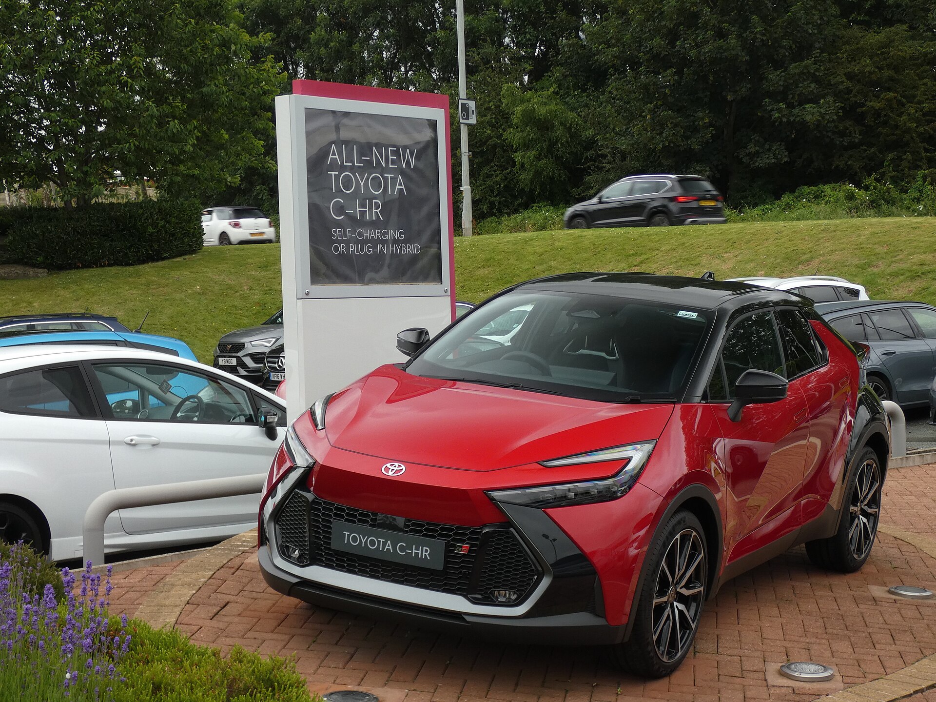 2024 Toyota C-HR GR Sport HEV in Scarlet Flare, front view
