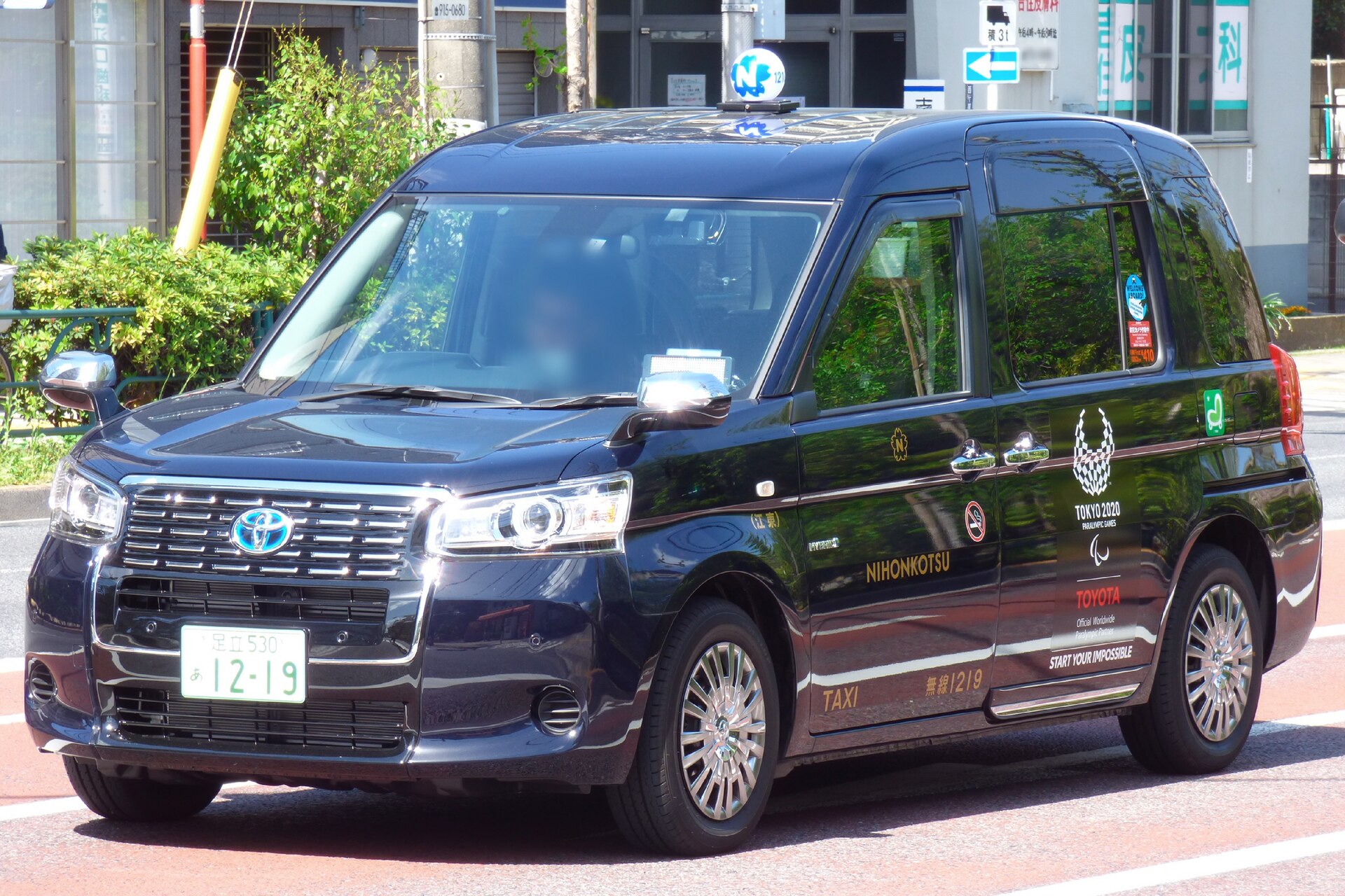 Toyota JPN Taxi operated by Nihon Kotsu, exterior view.