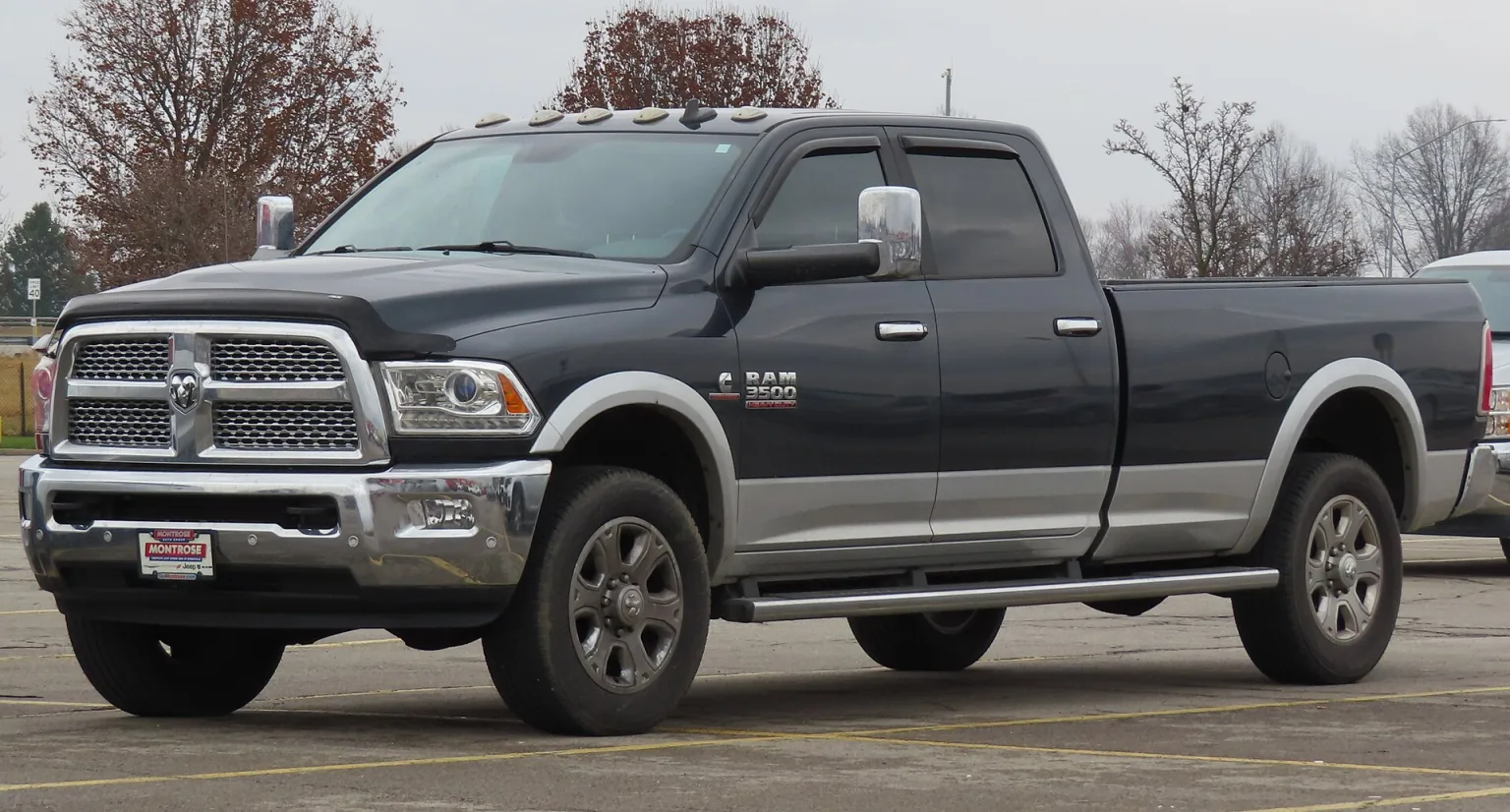 2018 Ram 3500 Laramie Crew Cab 4x4 with 8' Box, front left view