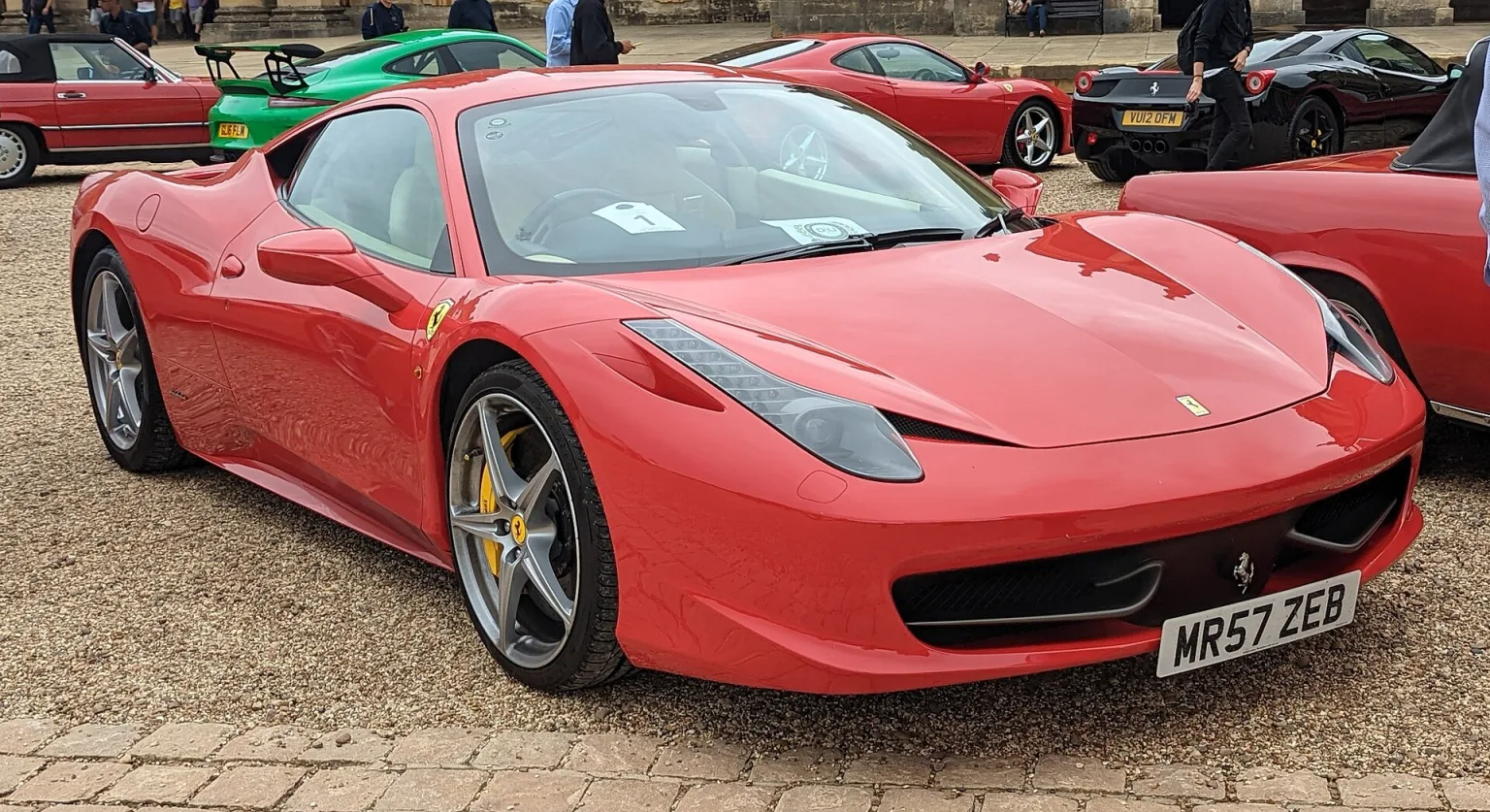 Ferrari 458 Italia in motion on a road