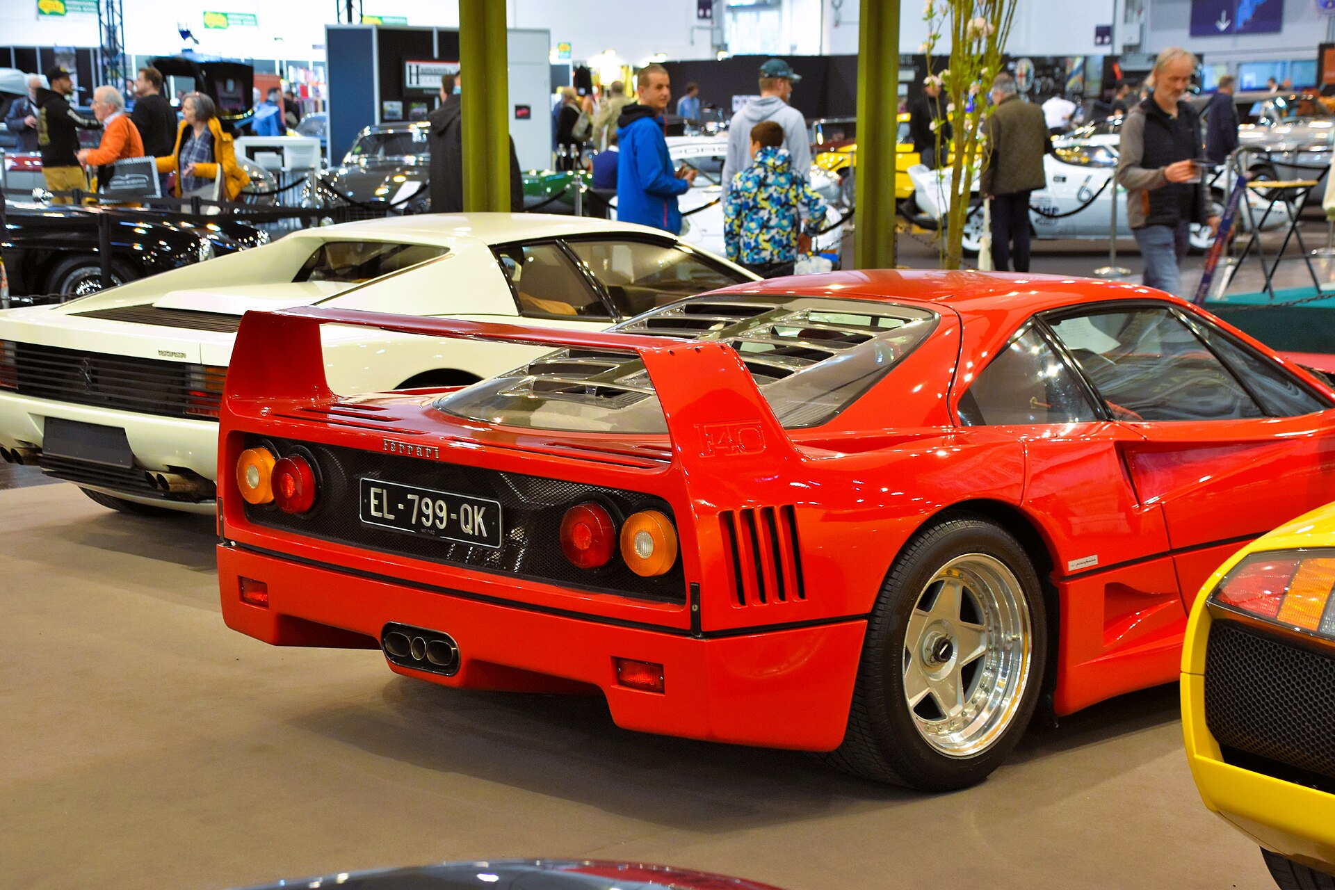 Ferrari F40 coupe in red, photographed in profile on a plain background