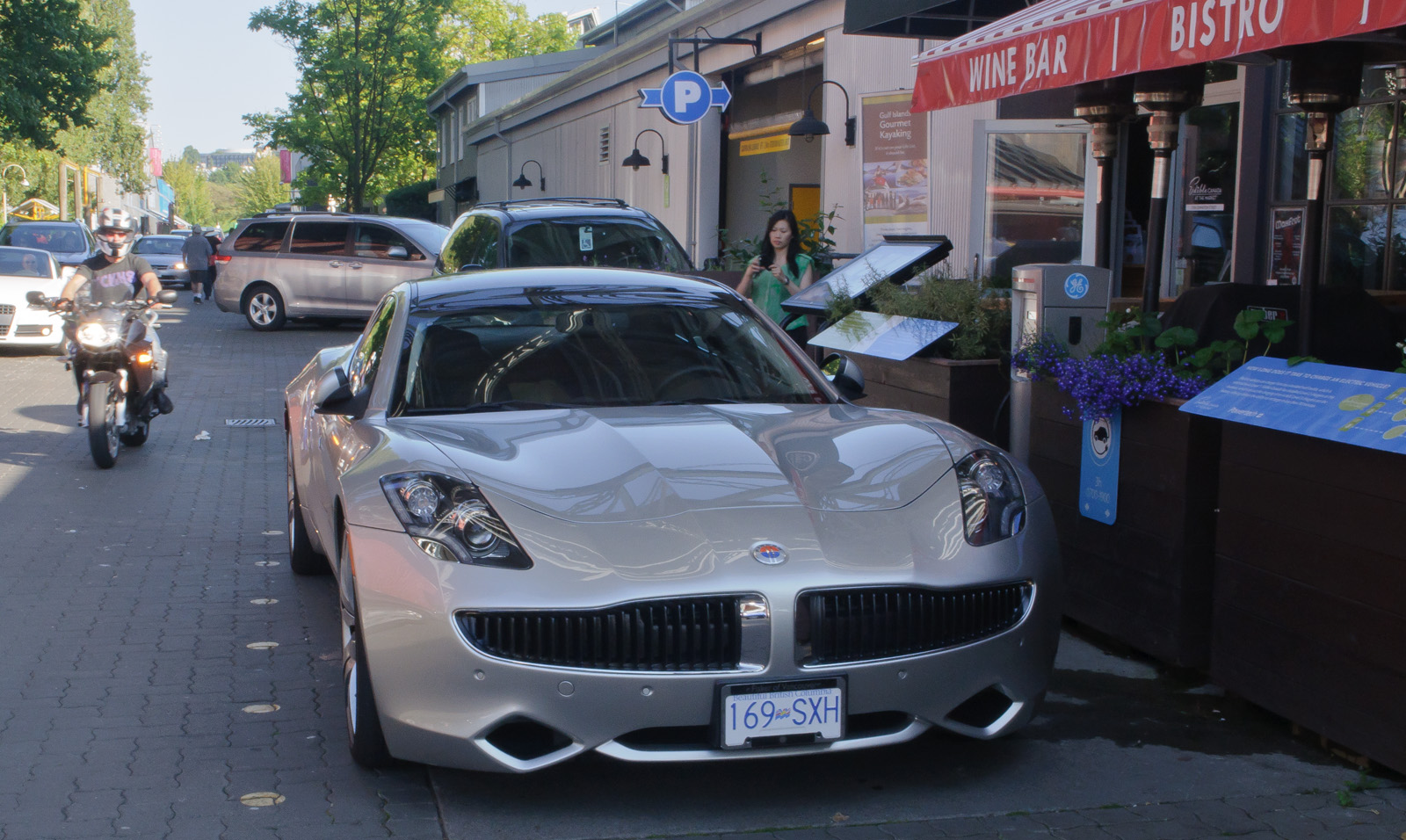 Fisker Karma sedan parked on a city street