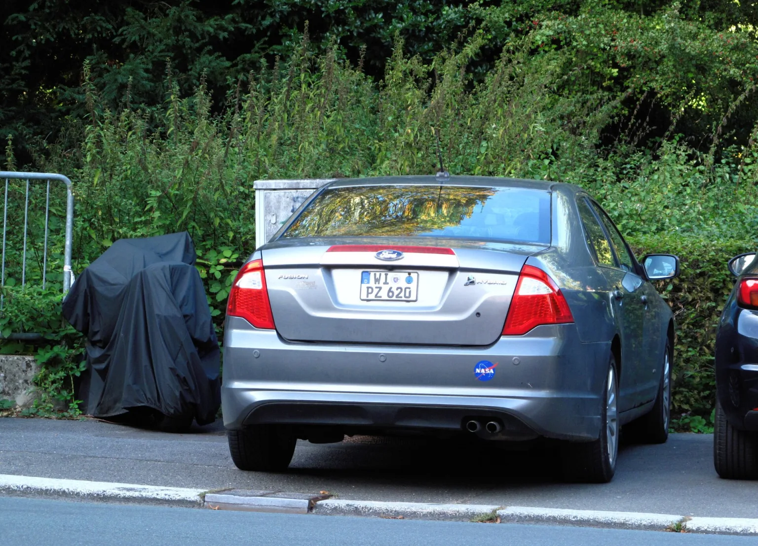 Ford Fusion Hybrid sedan parked outdoors