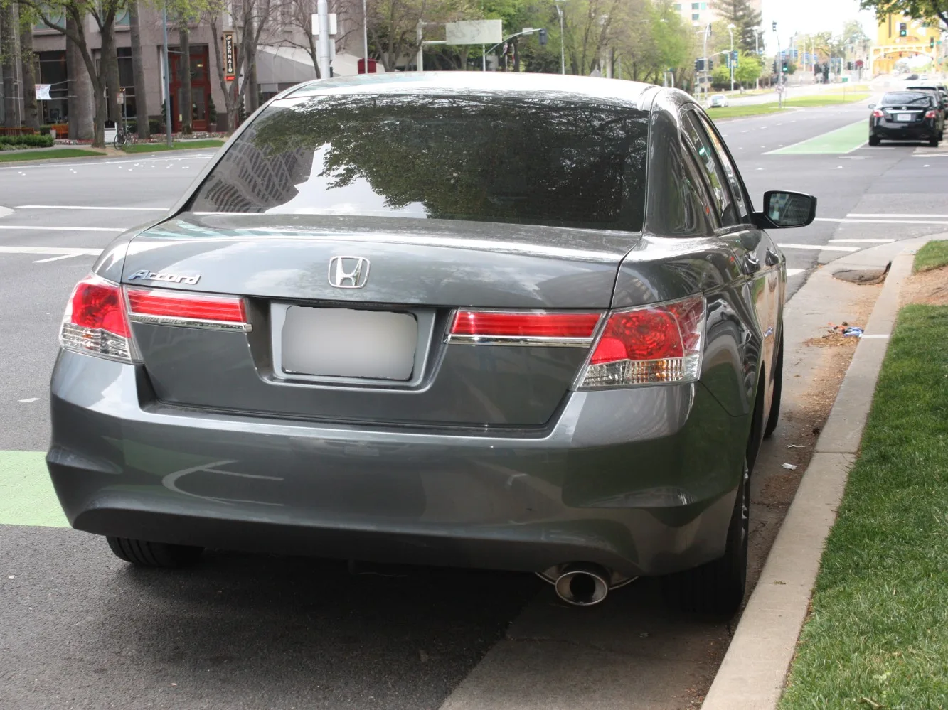 Honda Accord saloon parked on the street