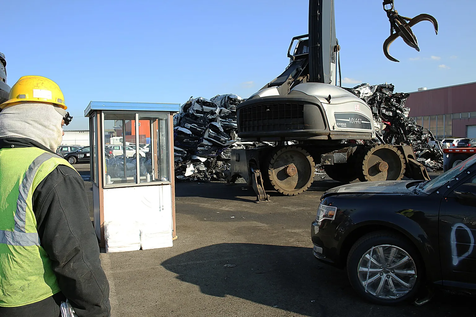 Flood-damaged cars at a demolition site after Hurricane Sandy in Jersey City, NJ