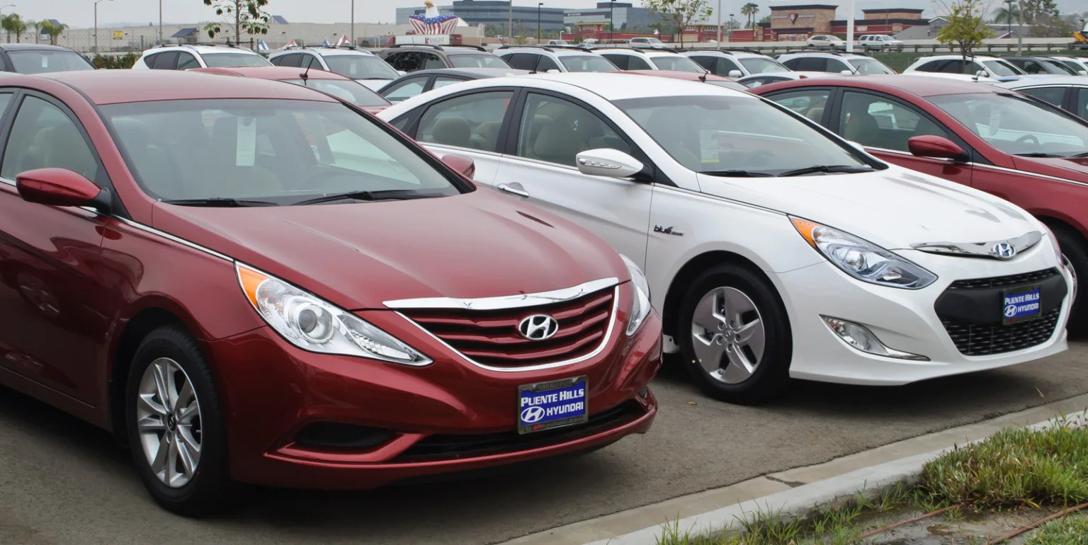 Hyundai Sonata GLS and Hybrid parked side by side