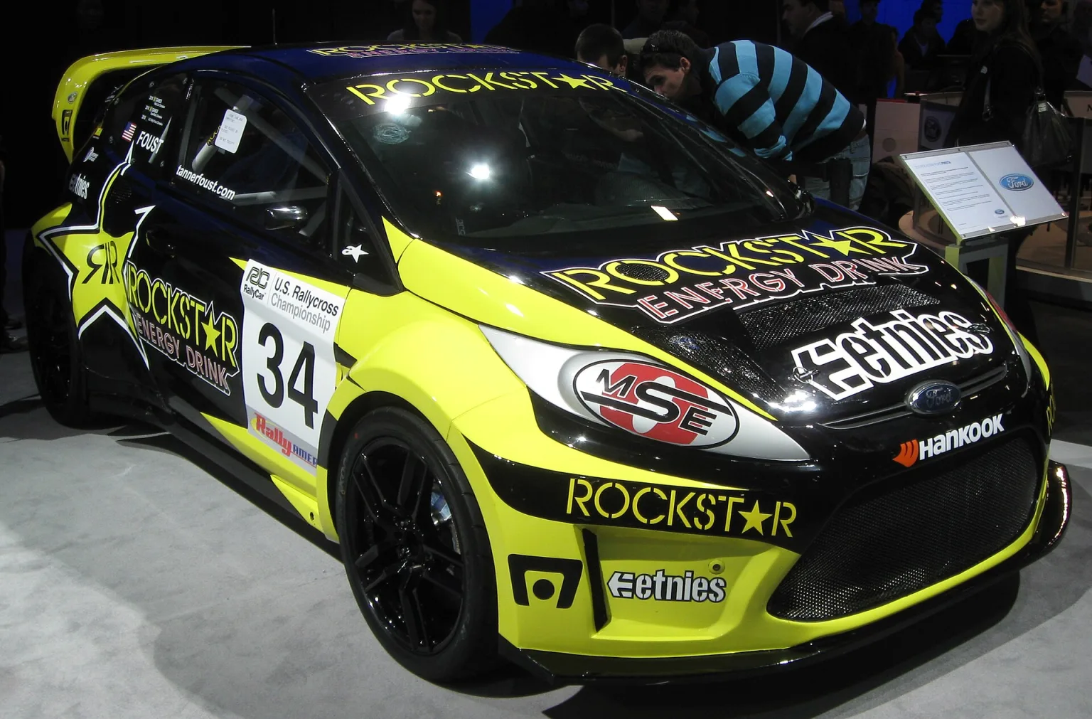 Ford Fiesta rally car in action on a dirt track