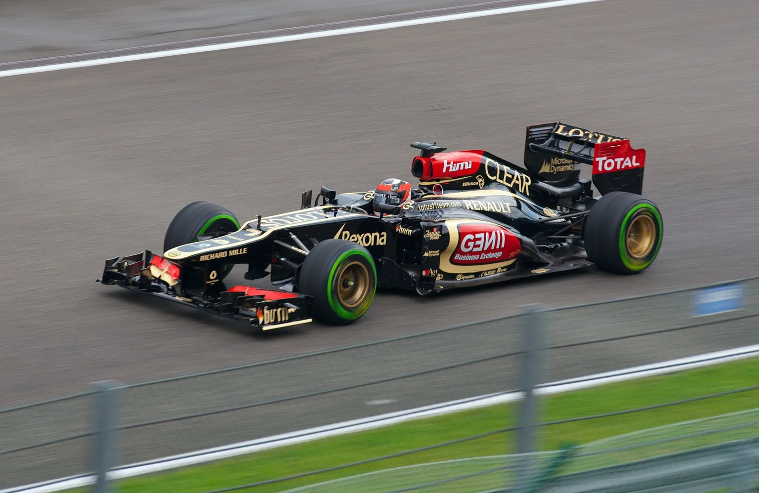 Kimi Räikkönen driving the Lotus E21 at the 2013 Belgian Grand Prix